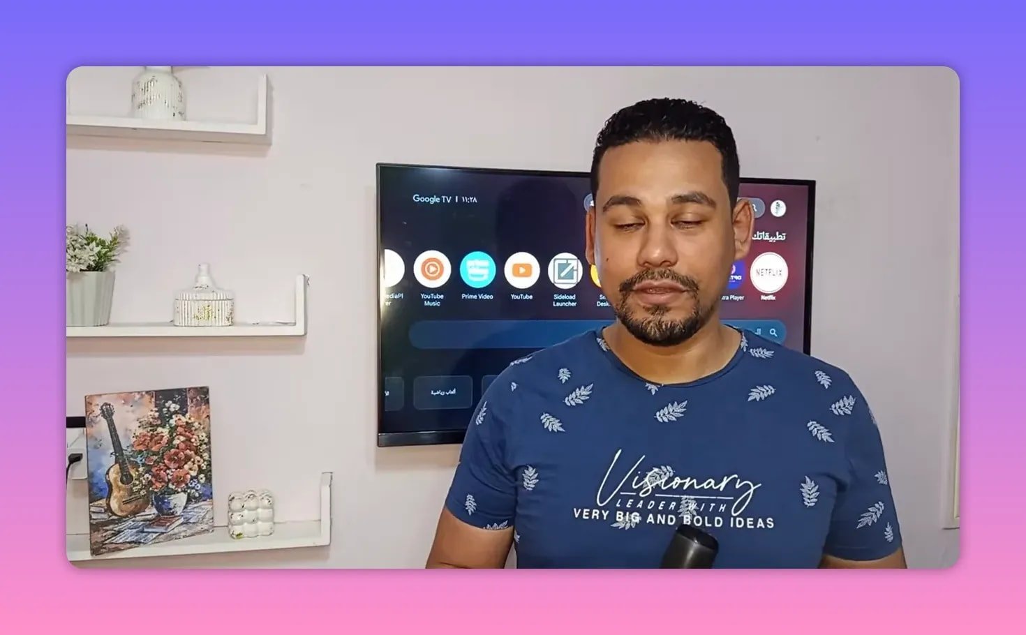 Presenter in front of a Google TV screen with visible launcher icons